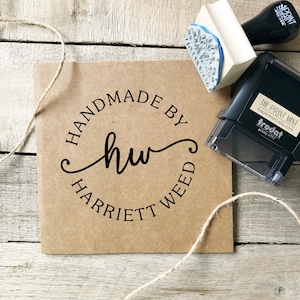 May include: A set of three ceramic mugs with a speckled, matte finish. The mugs are in cream, light grey, and dark grey. Each mug has a simple, minimalist design, ideal for coffee or tea.