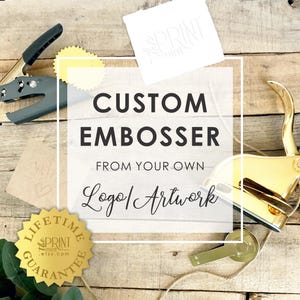 May include: A gold-colored metal embosser tool and a dark gray handheld hole puncher. A gold-colored serrated seal sticker and a white square paper with the text "the PRINT mint" are present. The text "CUSTOM EMBOSSER FROM YOUR OWN Logo/Artwork" is centered.