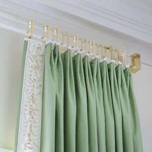 a close up of a curtain with a curtain rod