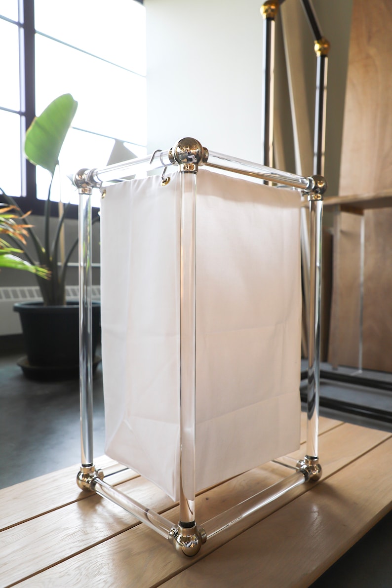 a white bag sitting on top of a wooden table