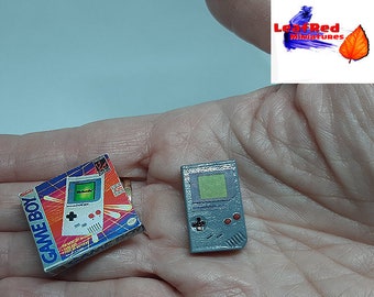 GAME BOY. Miniature console with box.