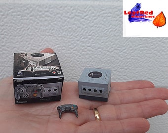 Nintendo GameCUBE RESIDENT EVIL. Miniature with controller and box. 3D miniature