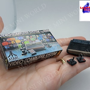 ATARI 2600 Miniature console with 2 controllers and box. 3D Miniature