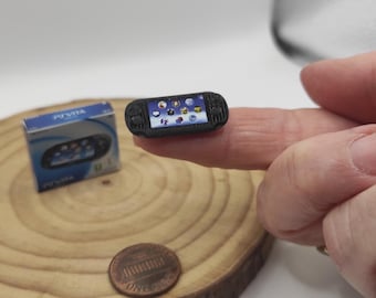 PS VITA Miniature console with box.