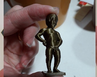 鋳鉄製の小便小僧の置物：ブリュッセル土産、銅仕上げ - Etsy 日本