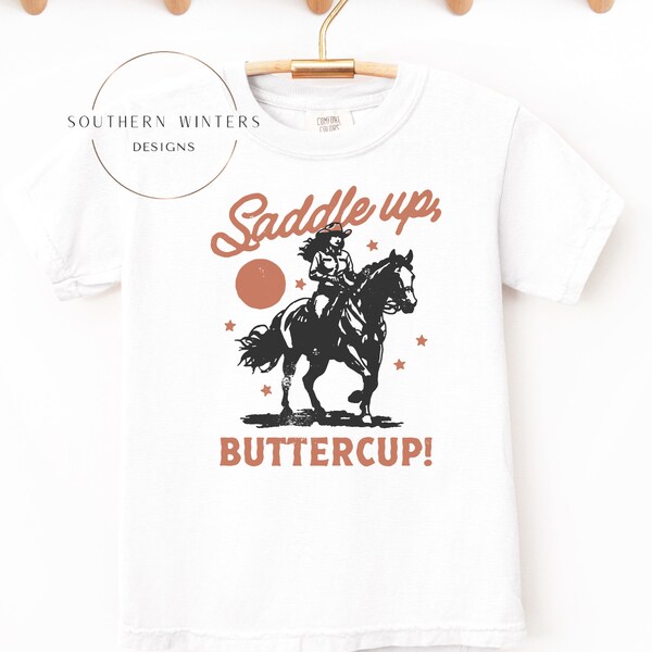 Youth "Saddle Up, Buttercup" trendy, graphic, rodeo t-shirt, kids cowgirl t-shirt, kids rodeo shirt, girls cowgirl shirt, youth rodeo shirt