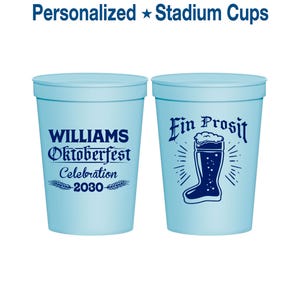 May include: Two light blue stadium cups. One cup has the text "WILLIAMS Oktoberfest Celebration 2030". The other cup has a beer boot graphic and the words "Ein Prosit". The text "Personalized Stadium Cups" is at the top.