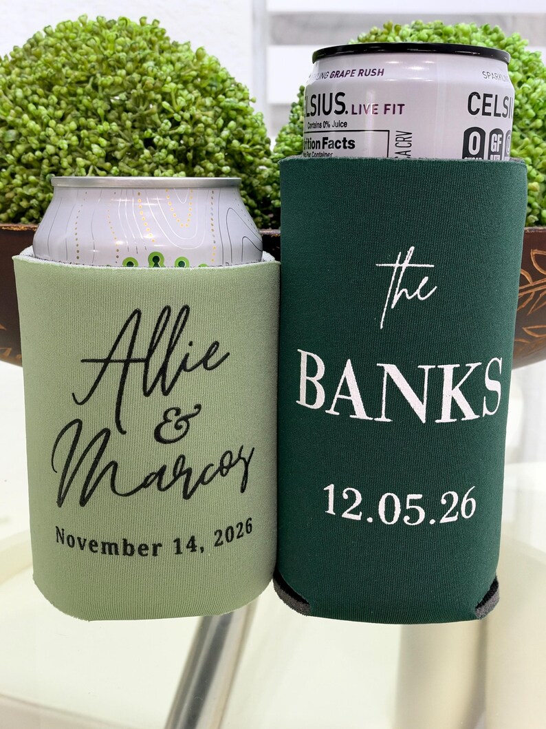 Two green and white beverage coolers with personalized text printed on them.