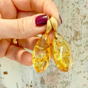 Yellow baltic Amber dangle earrings.Color natural genuine amber earrings.Shiny yellow amber women earrings with golden silver.Unique earring