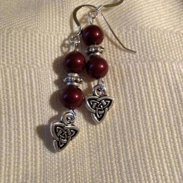 Bordeaux and silver pierced earrings with Celtic Triad charms.