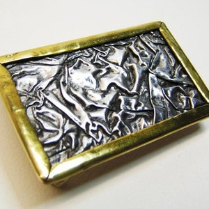 Bimetal belt buckle made of brass and aluminium