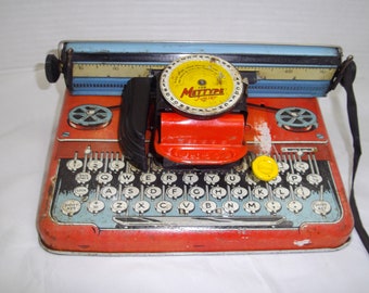 Vintage tinplate typewriter by Mettype c 1950's, toy