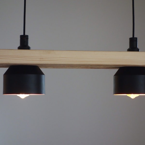 Hanging lamp made of old scaffolding plank