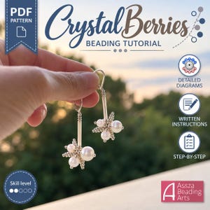 May include: A PDF beading tutorial titled Crystal Berries featuring instructions for earrings made with small metallic beads and white pearls. The document includes detailed diagrams, written instructions, and step-by-step guides for the project.