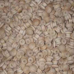 May include: A large pile of unfinished wooden knobs, perfect for crafting projects. The knobs are round with a small hole in the center.