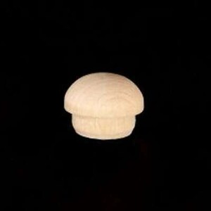 May include: A small, unfinished wooden knob with a rounded top and a cylindrical base.