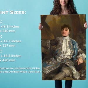 May include: A print size chart showing the dimensions of A4, A3, and A2 prints in inches and millimeters. The chart is printed on a blue background. The text "Print options are professionally Giclee printed onto Archival Matte Card Stock" is also included.