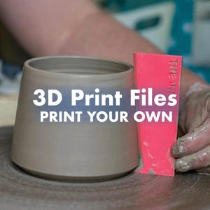 May include: A gray clay pot on a pottery wheel being shaped by a bright pink rectangular rib tool. The text 3D Print Files PRINT YOUR OWN is overlaid in white. The clay surface is smooth with visible horizontal lines from the shaping process.