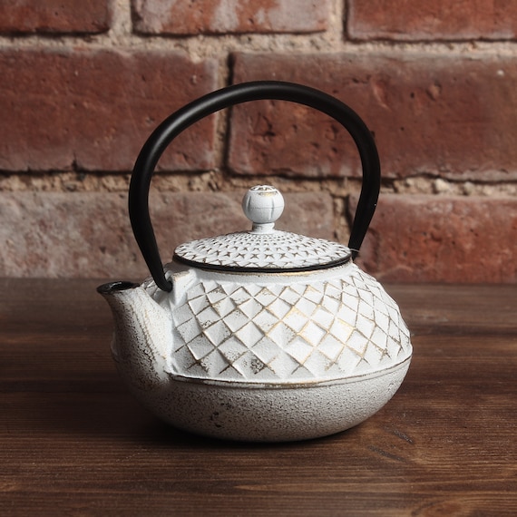 White cast iron teapot