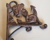 2 pc Cast Iron Anchor Plant Holders, 3 hook positions each wall mount