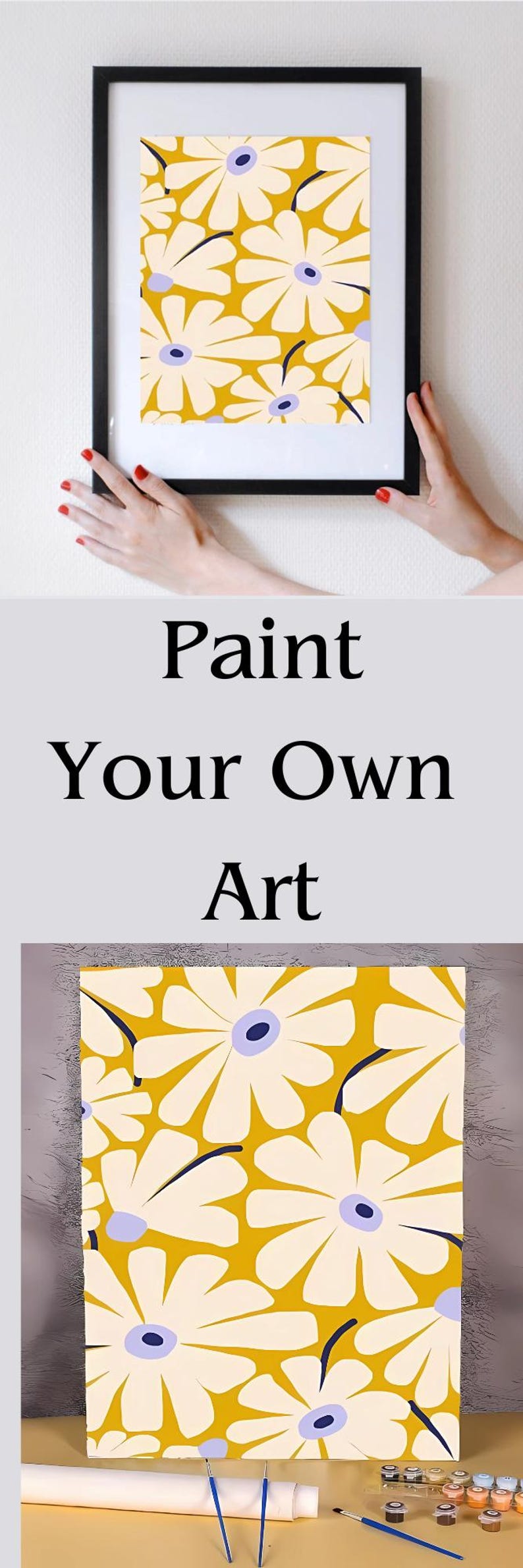 May include: Paint your own art kit featuring a canvas with a yellow background and white flowers with blue centers. The kit includes paint, brushes, and a rolled canvas.
