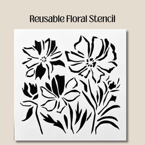 Puede incluir: Un est&eacute;ncil floral reutilizable con un dise&ntilde;o en blanco y negro de flores y follaje estilizados. El texto "Reusable Floral Stencil" est&aacute; impreso en la parte superior. El est&eacute;ncil est&aacute; sobre un fondo blanco.