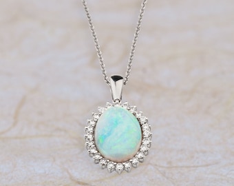 14k White Gold Opal Pendant With a 16 x 12MM  Oval Australian Opal 1.00ctw of G Color SI2 Clarity Diamonds