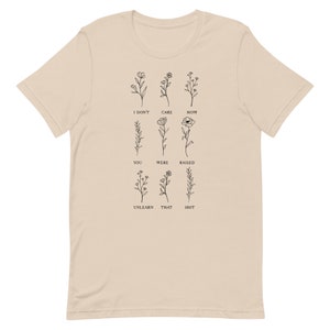 Floral Unlearn That Shit Unisex Graphic Tee T-shirt Gifts for Activists, Feminists Sizes XS, S, M, L, XL, 2XL, 3XL, 4XL, 5XL Soft Cream