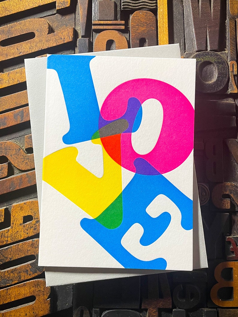 LOVE. Perfect to send a special message to a loved one. Printed with my own fair hands. The card is hand-fed into the press for each of the three colour passes. Striking colours using a deep impression print. Range of matching colours envelope.