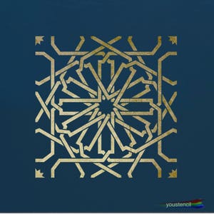 May include: A gold geometric pattern stencil on a dark blue background. The pattern is intricate and symmetrical, with a star-like shape in the centre.