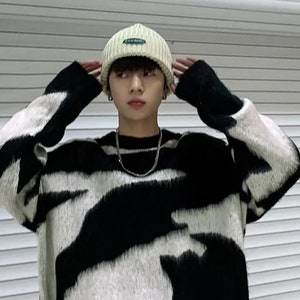 Grey and cheap white sweater