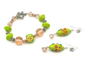 Vibrant handmade lampwork bead floral motif bracelet and earring set - Green and Peach