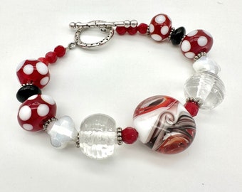 Original Lampwork Glass Bead Bracelet Red, White, Black and Silver Accents, Toggle clasp, and cool swirly design! Handmade torch bead bangle