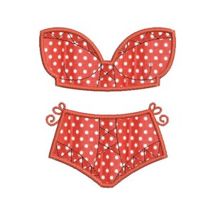 May include: Red and white polka dot bikini with a halter top and high-waisted bottoms.