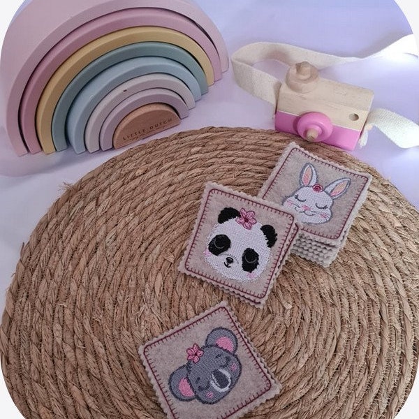 Motif de broderie machine  jeu memory à la façon Montessori avec des têtes d'animaux  version fille avec des fleurs