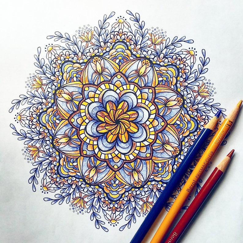 May include: A detailed mandala design with blue, yellow, and orange colors. The mandala is surrounded by a border of leaves and flowers.