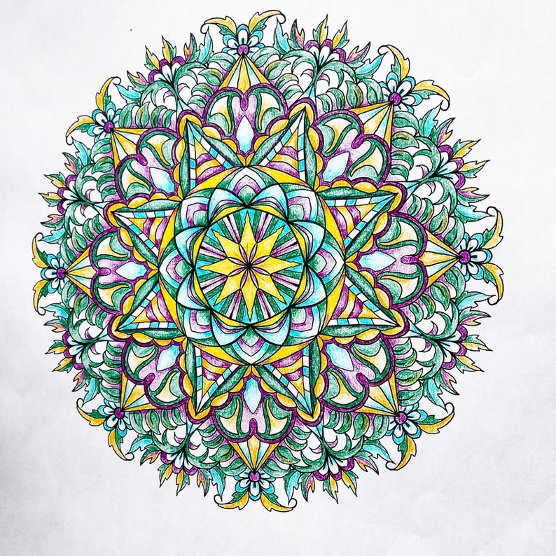 May include: A colorful mandala design with intricate details in shades of green, blue, yellow, and purple. The design features a central star shape surrounded by floral patterns.