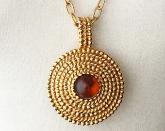 Stunning Gold Toned Pendant Necklace with Wound Rope Design and Amber-Colored Cabochon Center from Bubbly Creek on Etsy