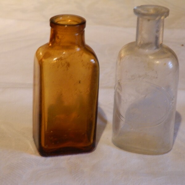 Two Antique small Glass Bottles