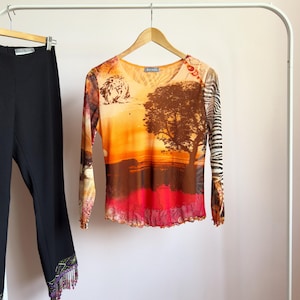 fine mesh safari print long sleeve top · y2k mesh shirt · lion zebra savannah print top · gem stone mesh shirt · lettuce hem mesh top · l/xl