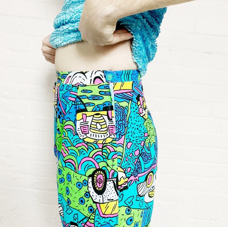 high waist graphic 80s print bermuda shorts \u00b7 neon beach gear \u00b7 vintage cartoon print trunks \u00b7 medium