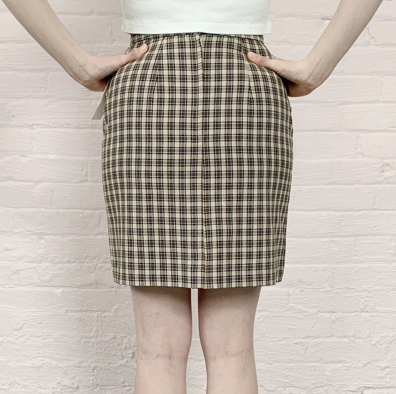 90s brown plaid school girl miniskirt \u00b7 90s miniskirt \u00b790s micro mini skirt \u00b7 heathers plaid skirt \u00b7 1990 skirt \u00b7 high waist mini skirt \u00b7 m