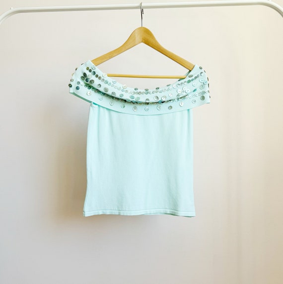 light blue off shoulder top with abalone flower sh
