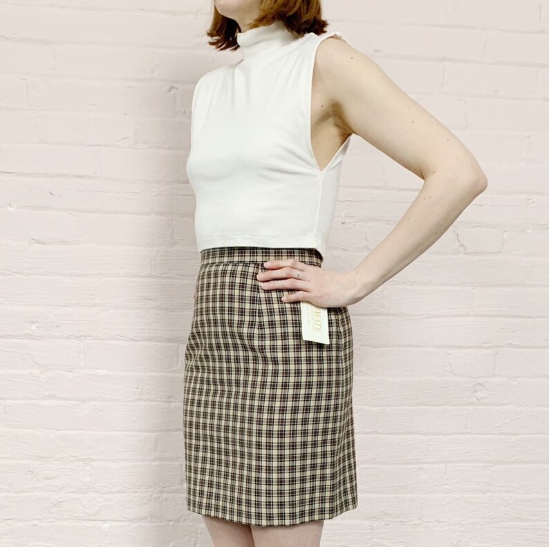 90s brown plaid school girl miniskirt \u00b7 90s miniskirt \u00b790s micro mini skirt \u00b7 heathers plaid skirt \u00b7 1990 skirt \u00b7 high waist mini skirt \u00b7 m