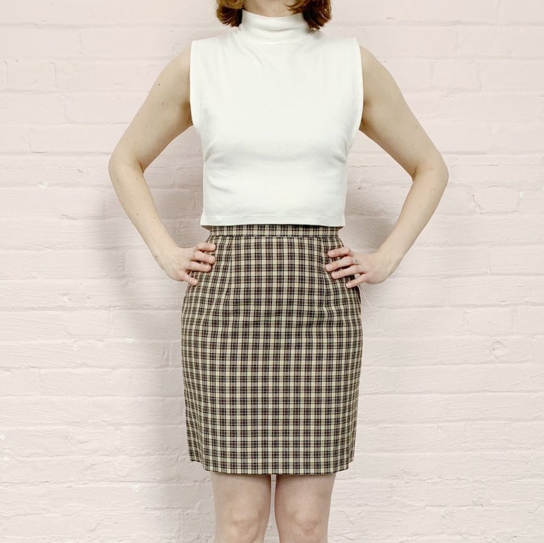 90s brown plaid school girl miniskirt \u00b7 90s miniskirt \u00b790s micro mini skirt \u00b7 heathers plaid skirt \u00b7 1990 skirt \u00b7 high waist mini skirt \u00b7 m