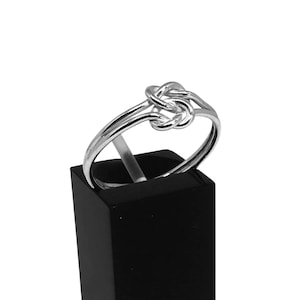 Sterling silver locked love hearts ring in solid sterling silver. Love heart ring, plain silver ring