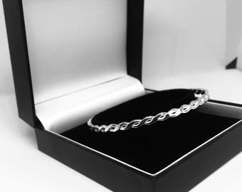Sterling silver celtic style double plait hallmarked bangle