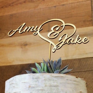 first name and heart wood cake topper example shows Amy & Jake