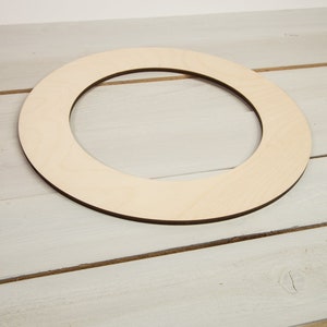 unfinished wooden ring shape for making a wreath, circle frame, or other craft projects