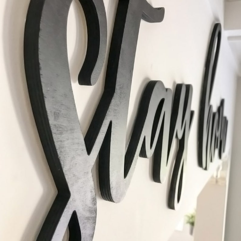 closeup of let's stay home letters